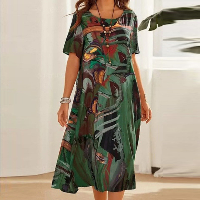 Beatrix printed round neck midi dress in green, front view