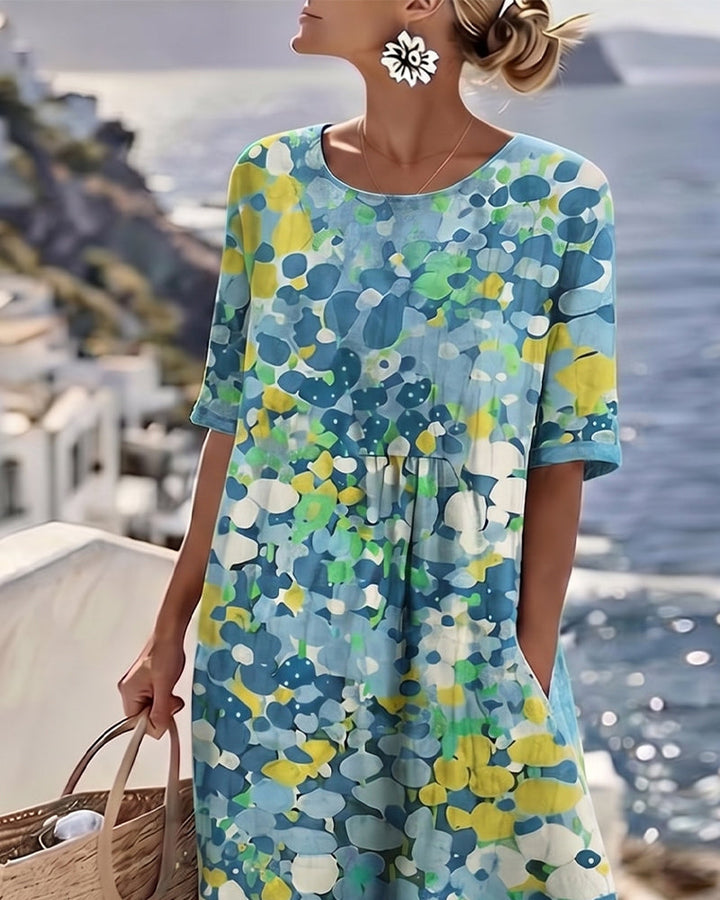 Coraline blue floral print midi dress, close-up neckline view