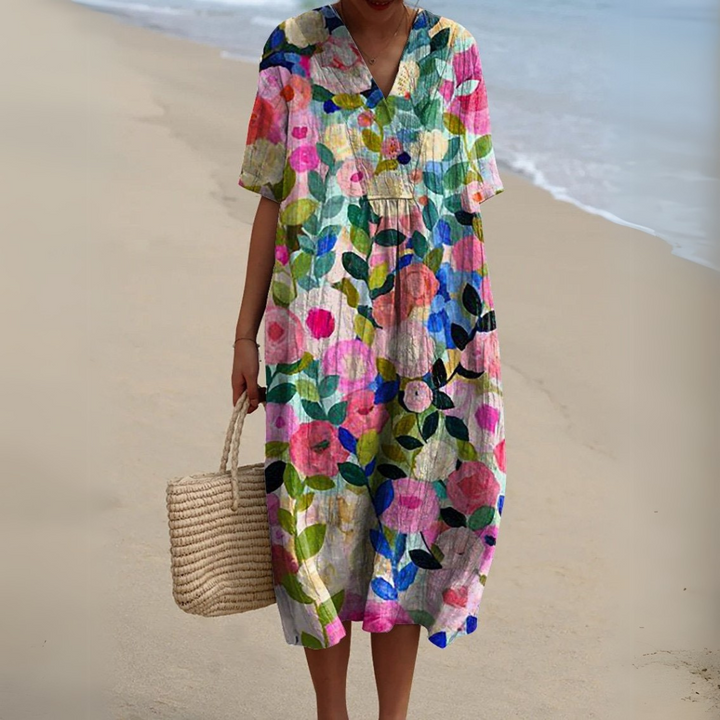 Florence multicolour floral V-neck midi dress, front view on model at the beach