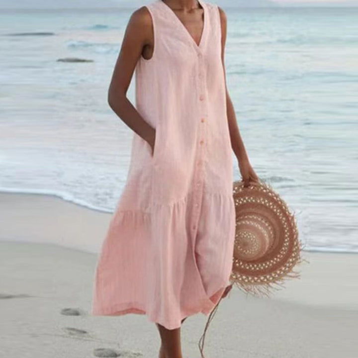 Harlow sleeveless V-neck midi shirt dress in pink, front view on beach
