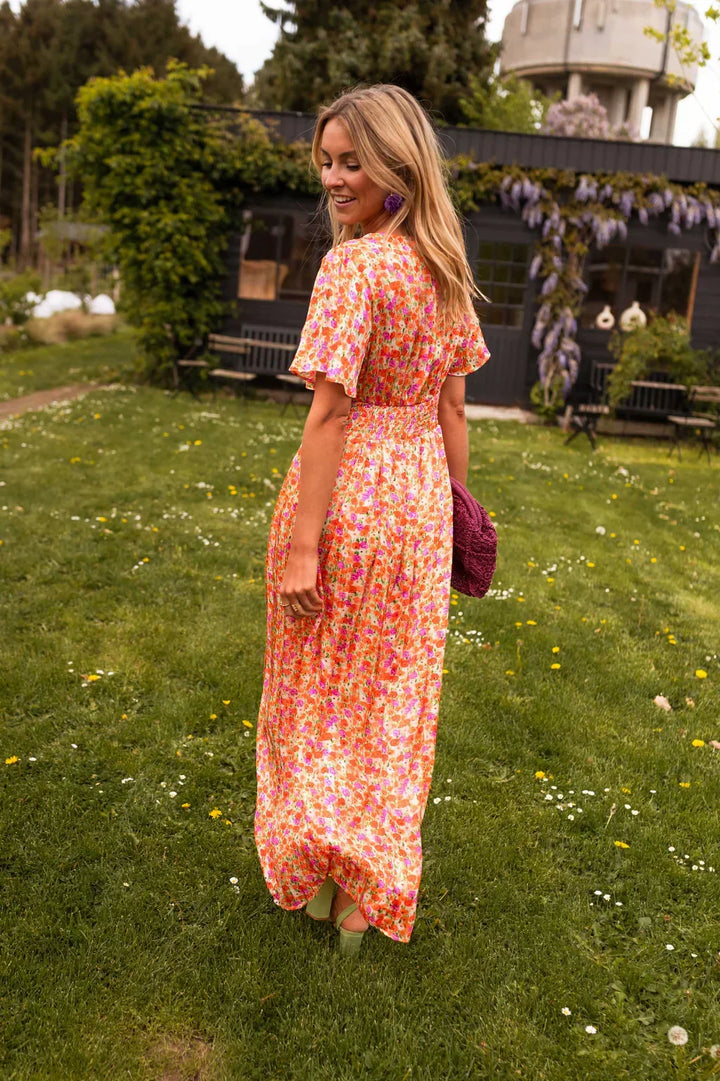 Margot floral maxi dress, back view showing waist detail