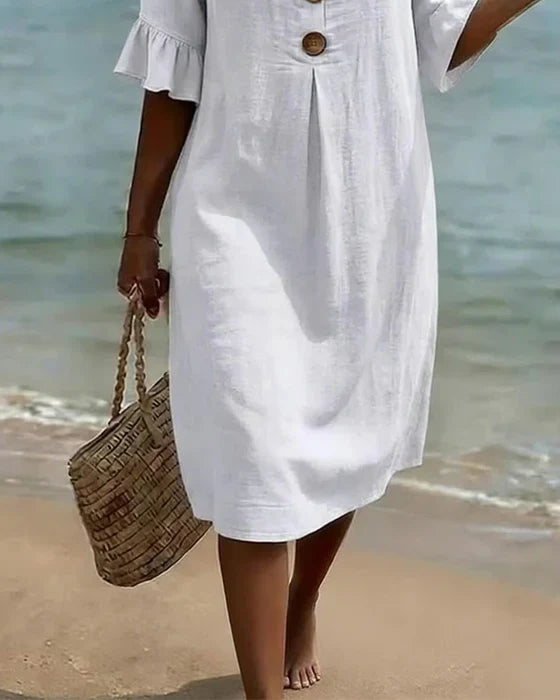 Marigold white midi dress skirt detail on beach