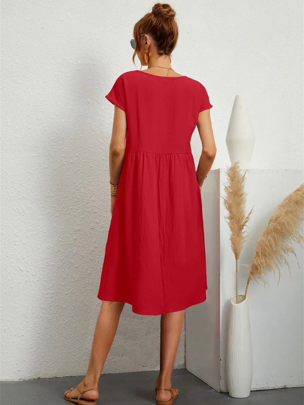 Odessa red midi dress, back view showing loose straight silhouette