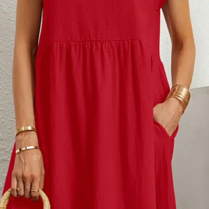 Close-up of Odessa red midi dress side pocket detail