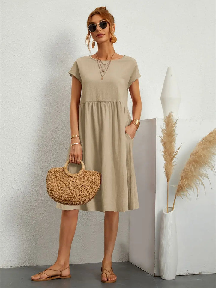 Odessa khaki round neck short sleeve midi dress with pockets, front view