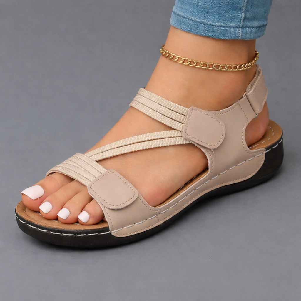 Rosalind strappy adjustable wedge sandals in beige, worn on foot