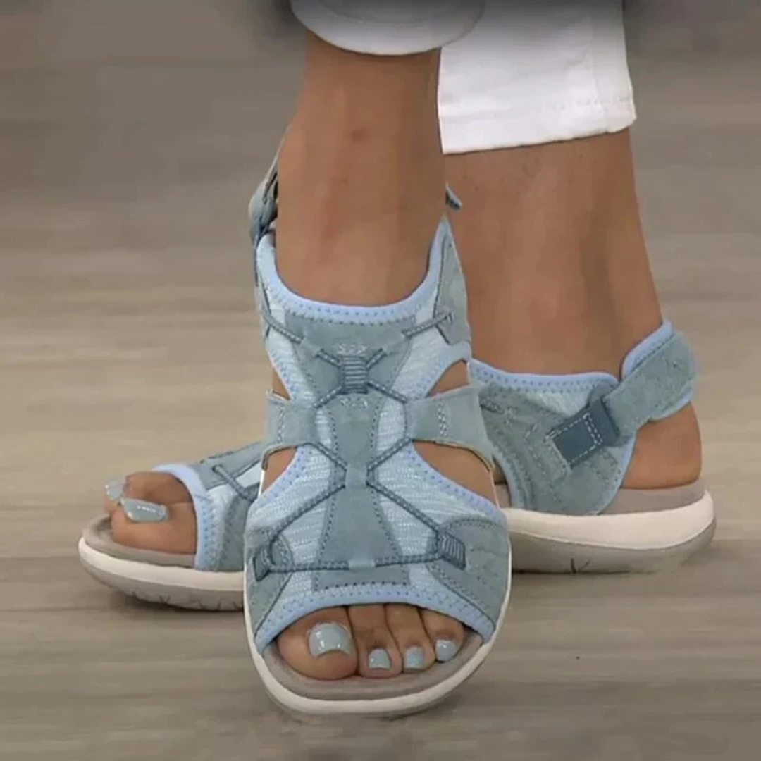 Sabine light blue strappy open toe sandals worn on feet, front view