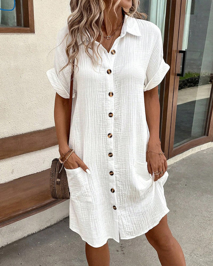 Sylvie white button-down shirt dress with front pockets, front view