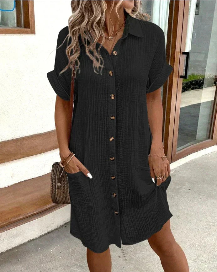 Sylvie black button-down shirt dress with front pockets, front view